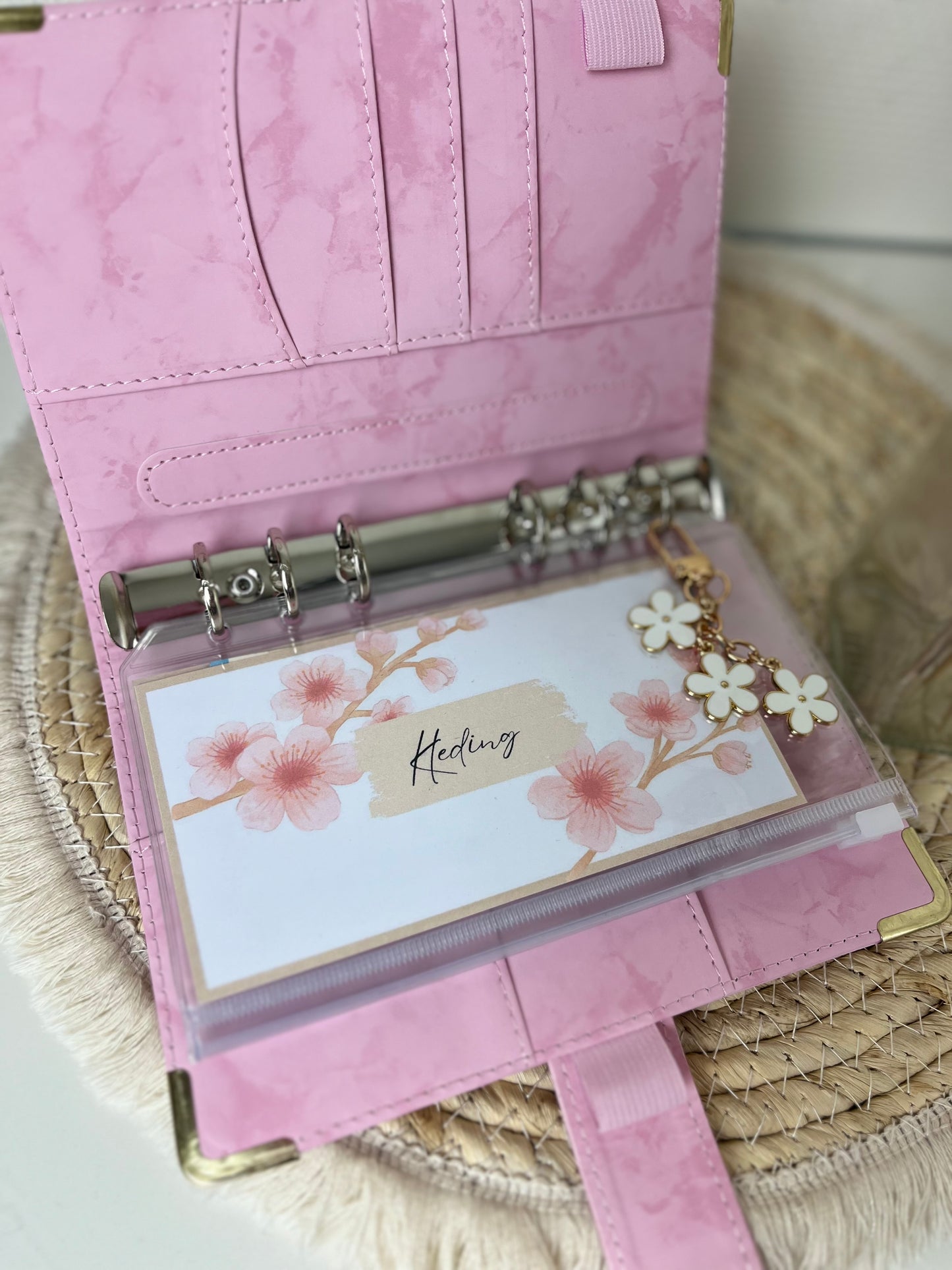 Binder marble roze A6
